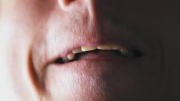 Person Runs Tongue on Lips and Closes Mouth After Shaving