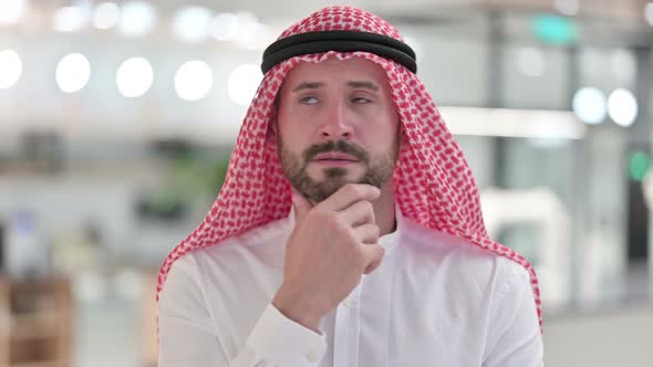 Pensive Arab Businessman Thinking New Idea