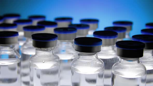 Group of Vaccine bottles. Medicine in ampoules. Glass vials for liquid samples in laboratory.