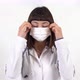 A woman doktor takes off mask and speak. - VideoHive Item for Sale