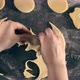 Woman prepares butter cookies at home in the kitchen. - VideoHive Item for Sale