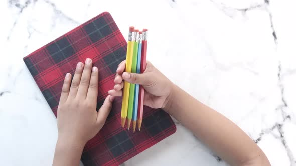 Child Girl Holding Many Color Pencils