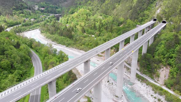 Aerial View of the Concrete Highway Viaduct on Concrete Pillars in the Mountains