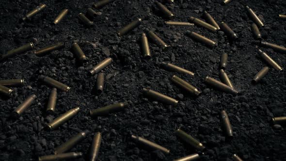 Bullets Scattered Over Ground Moving Shot