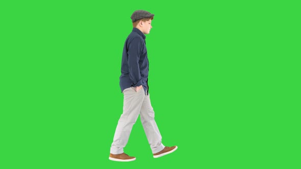 Stylish Teenage Boy Shirt Cap Walking Green Screen Chroma Key