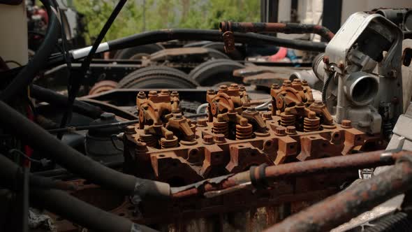 Close Up Shot of Parts Old Engine Broken Truck in a Scrap Yard Near the City