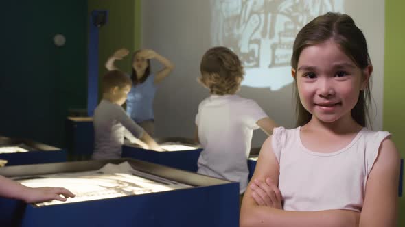 Cute Girl Posing in Sand Animation Class