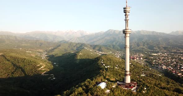 The High Tv Tower in Kok Tobe. a Panorama of The Green Mountains and Part of The City of Almaty