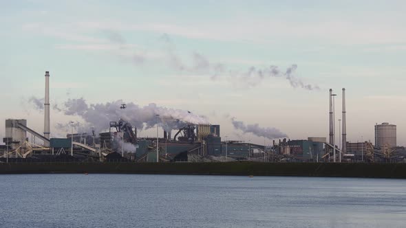 Aerial view of factory Tata Steel with smoking chimneys in Holland