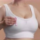 Young Caucasian Female in a White Seamless Bra Put Pink Ribbon for Breast Cancer - VideoHive Item for Sale
