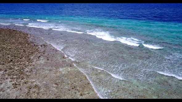 Aerial view landscape of marine tourist beach voyage by turquoise lagoon with white sand background 