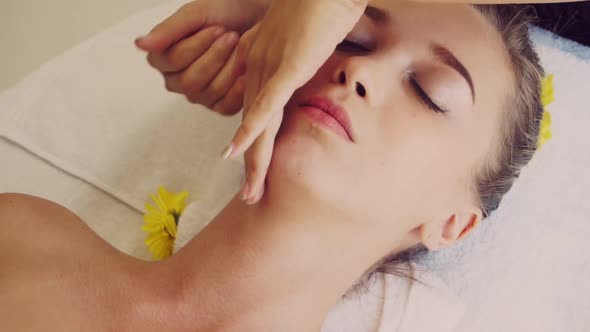 Woman Gets Facial and Head Massage in Luxury Spa