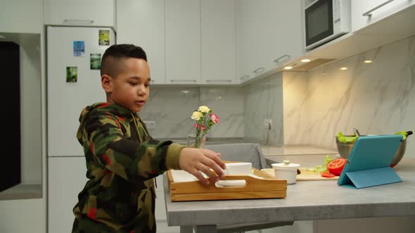 Son Carrying Meal to Mother Congratulating Parent with Holiday at Home