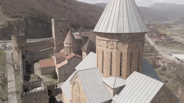 Aerial view of old Ananuri Fortress with two churches and picturesque view on river. Georgia 2021