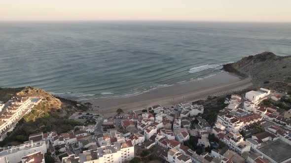 Panoramic aerial view of a small beach of Praia do Burgau, Algarve Budens Portugal.