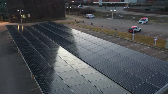 Rooftop of solar powered ev car charging station in Porsgrunn Norway - Hundreds of solar panels prod