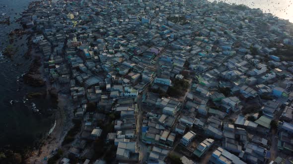 Aerial circle view over city named Phan Ri: densely populated. Vietnam.