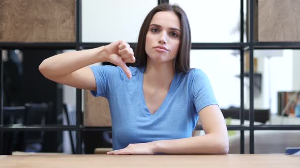 Thumbs Down By Beautiful Woman, Indoor Office