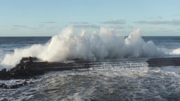 Powerful Storm Waves Crashing Against the Shore