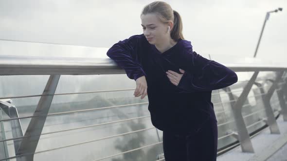 Portrait of Young Sportswoman Stop Running Due To Pain in Chest