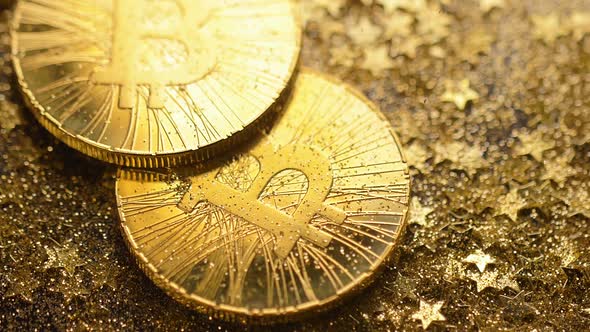 Bitcoin Pile Falls Down with Golden Stars Shower Macro