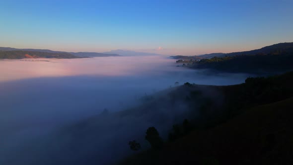 4K Aerial view of Mountains landscape with morning fog.