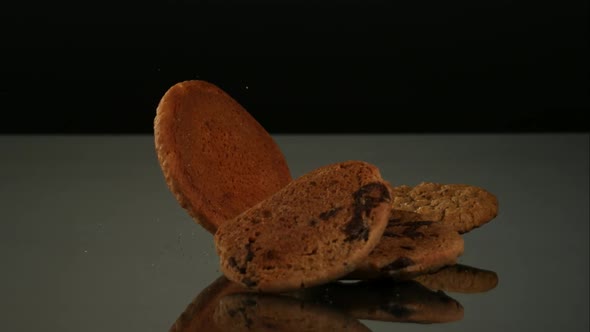 Cookies falling and bouncing in ultra slow motion