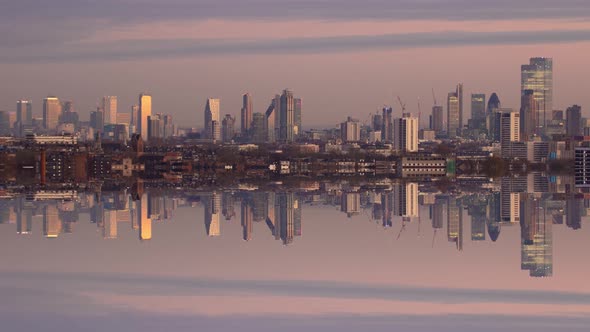 Day to night timelapse of the London skyline perfectly reflecting itself