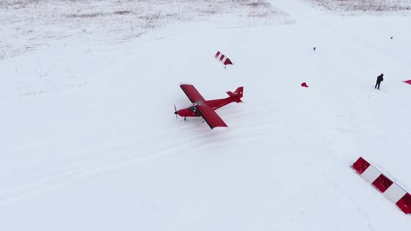 Red light aircraft Savannah. View from a height in winter