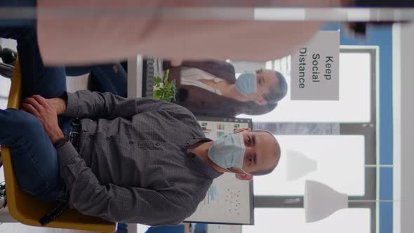 Vertical Video Portrait of Entrepreneur Man Wearing Protective Face Mask Against Coronavirus