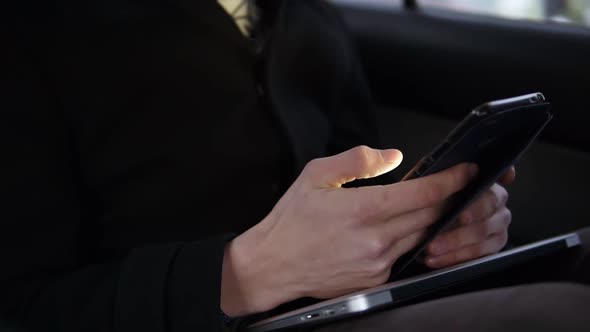 Male Hands Typing and Scrolling Something on Smartphone