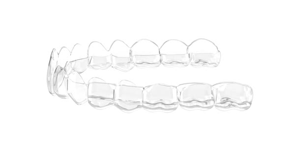 Clear and removable retainer movement over white background