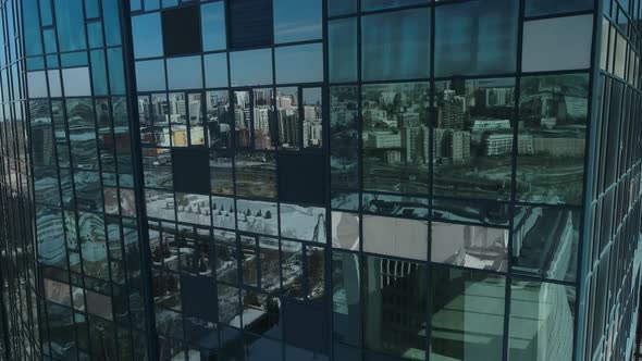 Aerial Photography of Large Windows That Reflect the Winter Landscape