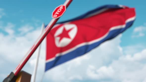 Closed Gate on the North Korean Flag Background