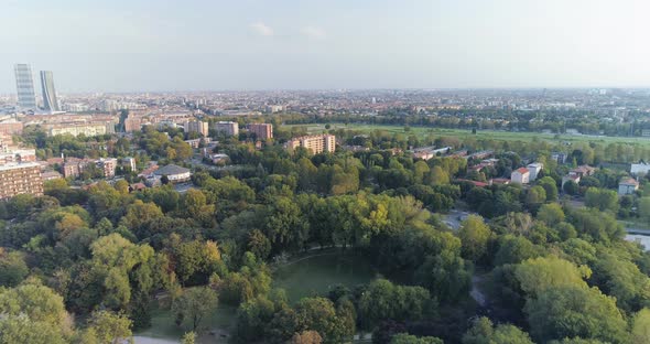 Aerial view of lake and city on a sunny day