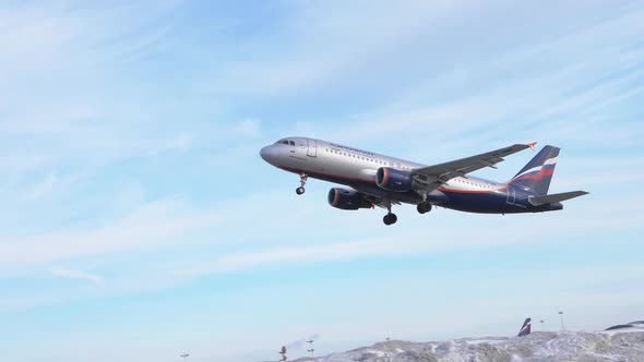 Aeroflot Aircraft Take-off and Climb in Blue Sky