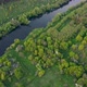 View of the river from above. Flight over water and forest trees from a height - VideoHive Item for Sale