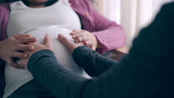 Pregnant Couple Feels Love and Relax at Home