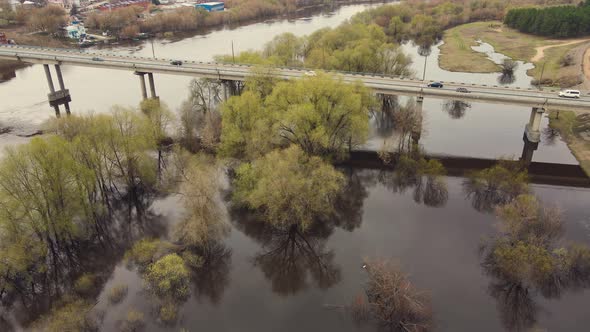 Wide Flood of the River Road Bridge Spring Flood Aerial View