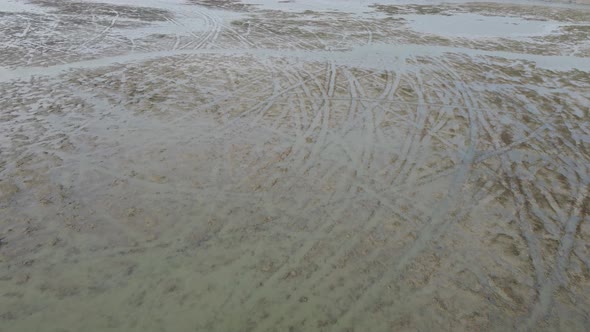 Aerial look down muddy land