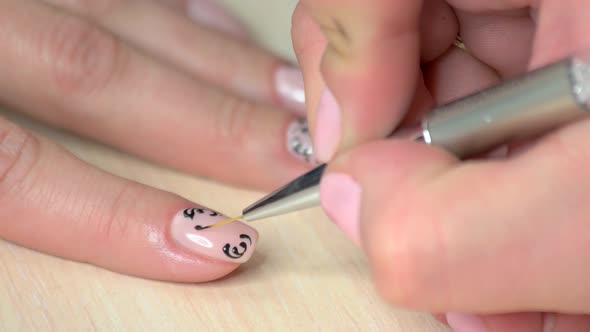 Beautician Doing Manicure To Young Person.