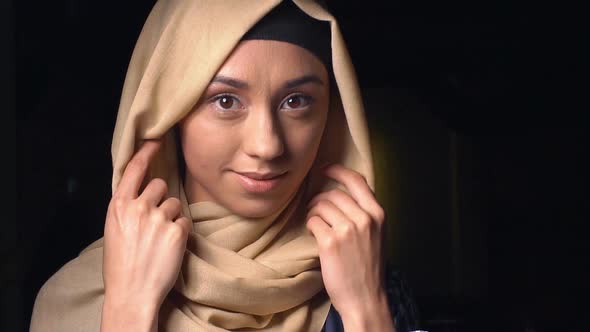 Portrait of an Attractive Young Modern Muslim Woman in Hijab.