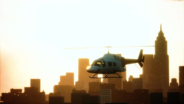 Silhouette Helicopter at City Scape Background