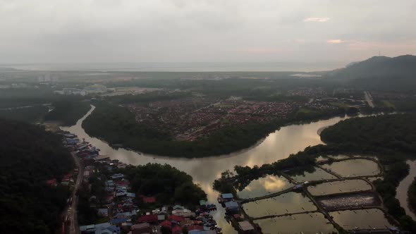 Drone view descending look at shrimp farm 