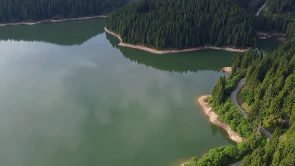 Scenic Mountain Lake And Forest Aerial View