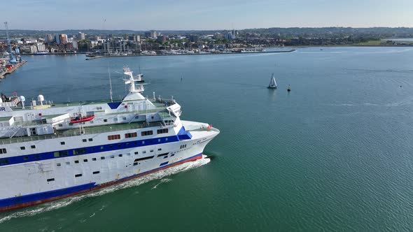 A Passenger Ferry Departing A Harbour in the Summer