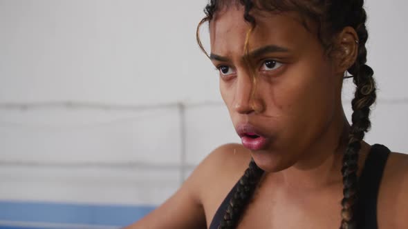 Mixed race women concentrating before a match