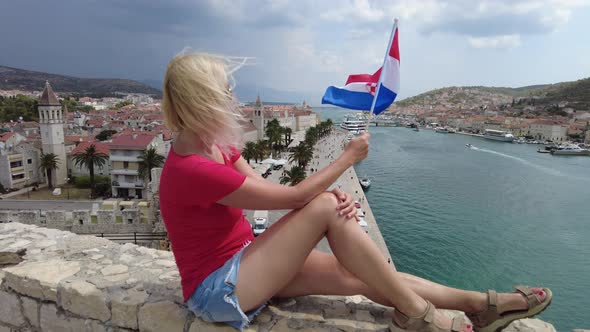 Woman with Croatian Flag in Trogir