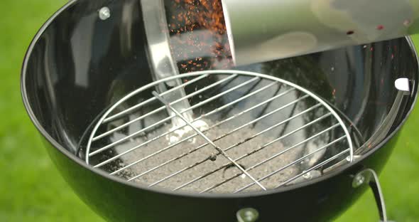 Glowing Charcoal Falls into the Kettle Grill