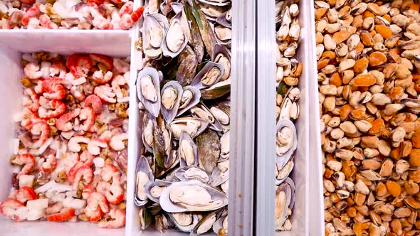 Mussels, Shrimp and Fish Laid Out on the Counter in the Seafood Market.